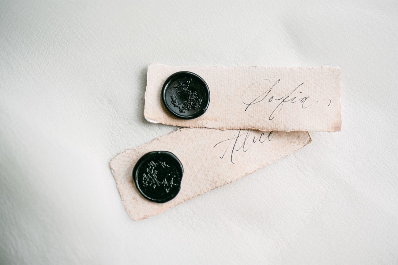 black wax seals blush place cards